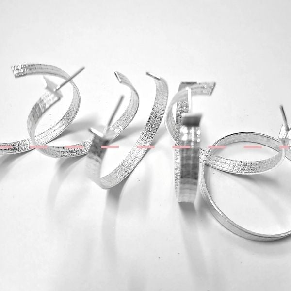 Handmade silver hoop earrings in Sydney