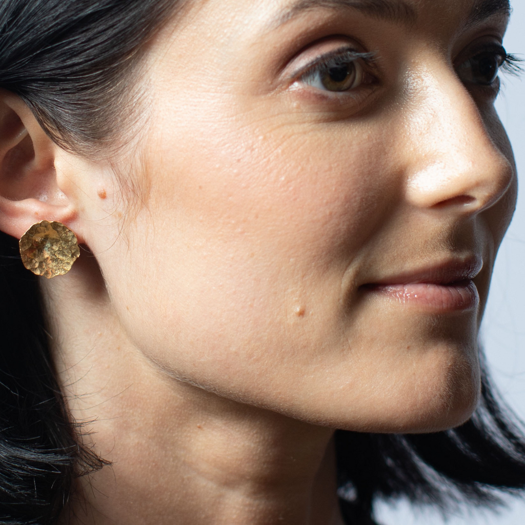 HAMMERED ROUND GOLD STUDS - Connie Dimas